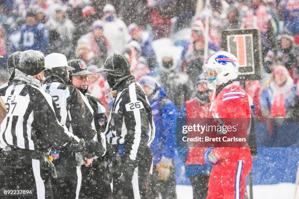 Referees discuss a Indianapolis Colts two point conversion attempt that was called back due to penalty during the fourth quarter against the Buffalo...