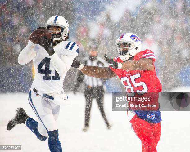 Matthias Farley of the Indianapolis Colts intercepts a pass intended for Charles Clay of the Buffalo Bills in the final in the final minutes of the...