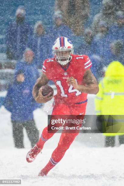 Joe Webb of the Buffalo Bills carries the ball during overtime against the Indianapolis Colts at New Era Field on December 10, 2017 in Orchard Park,...