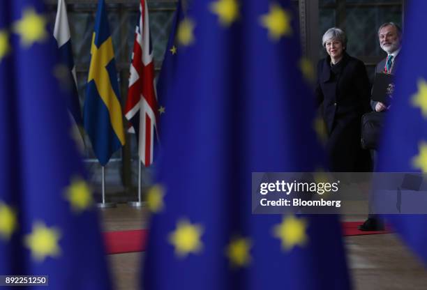 Theresa May, U.K. Prime minister, left, and Tim Barrow, U.K. Permanent representative to the European Union , arrive at a European Union leaders...