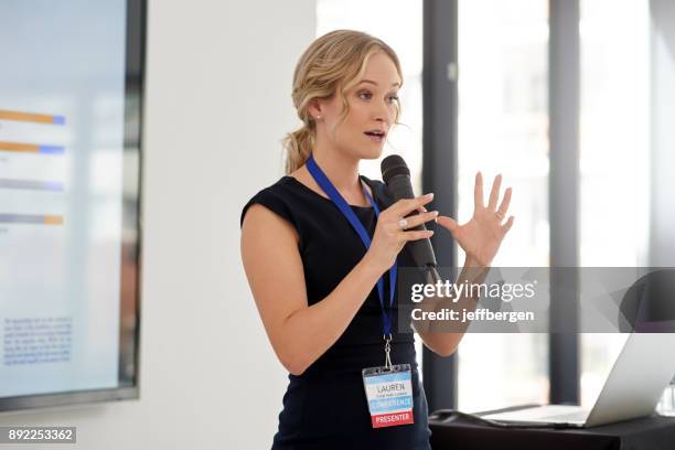 bringing game changing ideas to the conference - public speaking stock pictures, royalty-free photos & images