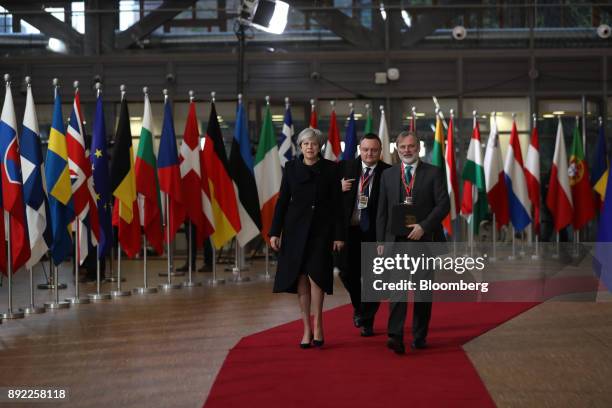 Theresa May, U.K. Prime minister, left, and Tim Barrow, U.K. Permanent representative to the European Union , right, arrive at a European Union...