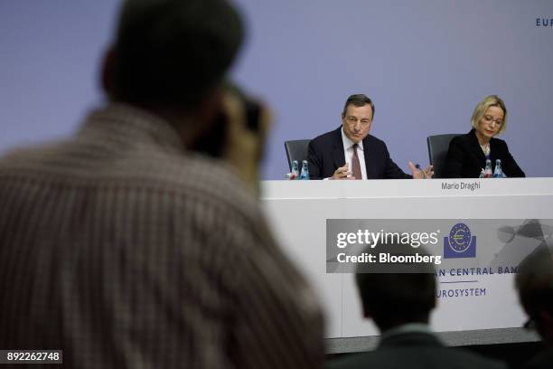 Mario Draghi, president of the European Central Bank , speaks as Christine Graeff, director general for communications at the European Central Bank ,...