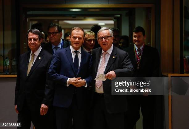 Donald Tusk, president of the European Union , center left, and Jean-Claude Juncker, president of the European Commission, center right, arrive for a...