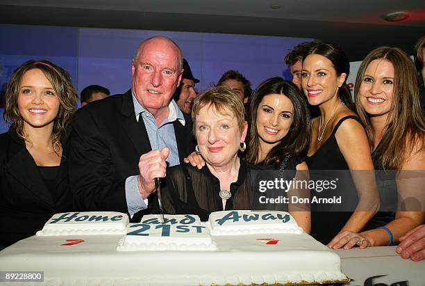 Kristy Hayes, Ray Meagher, Lyn Collingwood, Ada Nicodemou and Esther Anderson oversee a cutting of the cake during the Home & Away party at Cargo Bar...