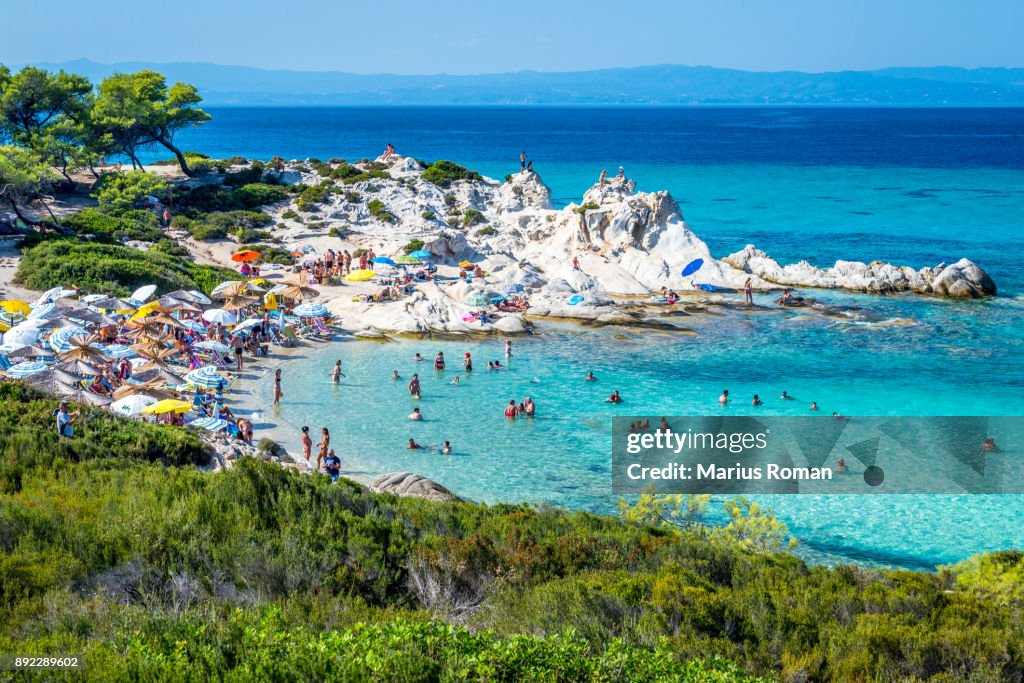 Beautiful Orange beach on the east coast of Sithonia peninsula, Halkidiki, Aegean sea, Greece.