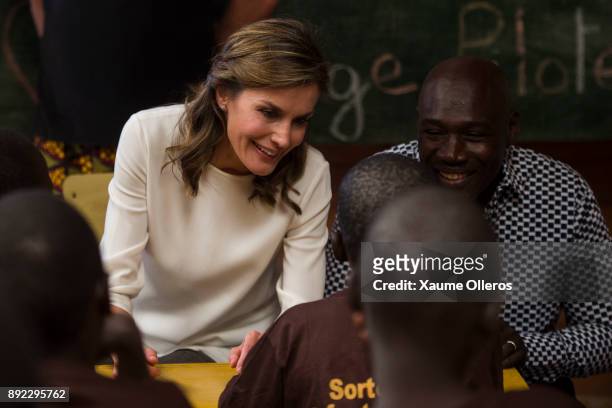 Queen Letizia of Spain visits Village Pilote, an organisation providing help for street children, on December 14, 2017 in Dakar, Senegal. Queen...