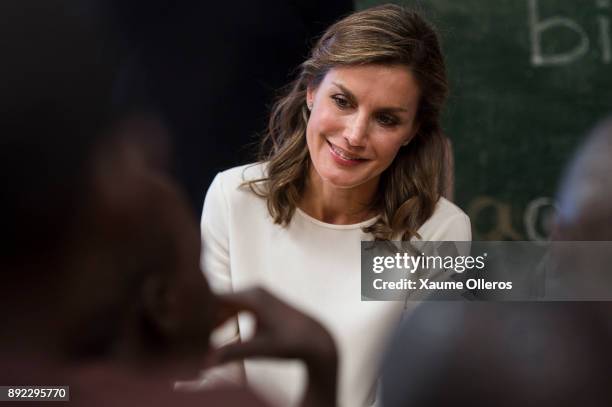 Queen Letizia of Spain visits Village Pilote, an organisation providing help for street children, on December 14, 2017 in Dakar, Senegal. Queen...