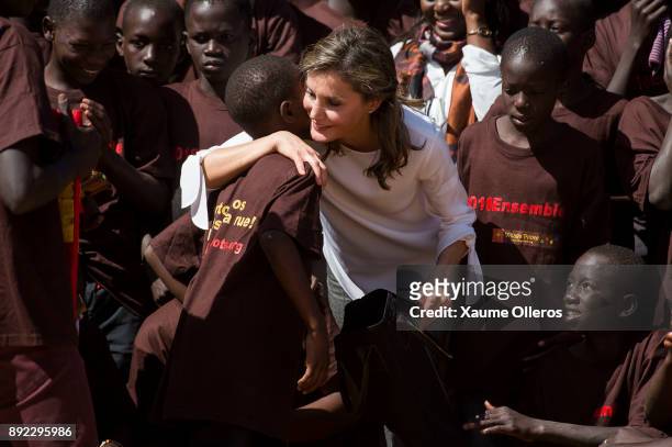 Queen Letizia of Spain visits Village Pilote, an organisation providing help for street children, on December 14, 2017 in Dakar, Senegal. Queen...