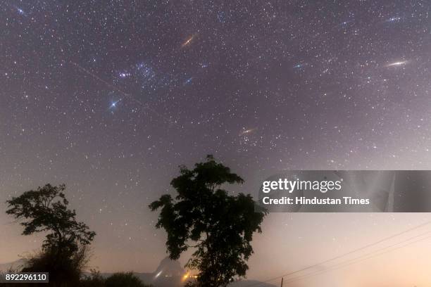 Geminid meteor shower seen from Pawna lake near Lonavala on December 14, 2017 in Mumbai, India. Stargazers across the globe braved the winter chill...