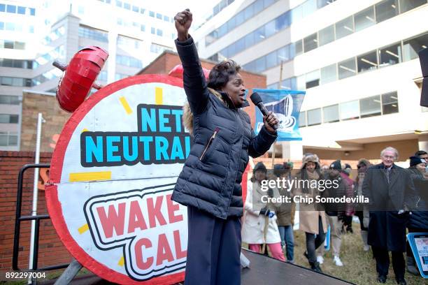 Federal Communication Commission Commissioner Mignon Clyburn addresses protesters outside the Federal Communication Commission building to rally...