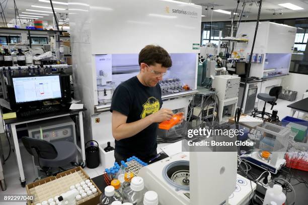 Fermentation engineer Rob Dahl uses eppendorf tubes with a fermentation broth in the Ginkgo Bioworks foundry in Boston on April 25, 2017. Calling...