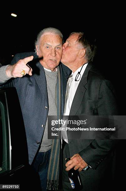 Media personalities John Laws and John Singleton are seen leaving Catalina Restaurant on July 23, 2009 in Sydney, Australia. The pair had been...