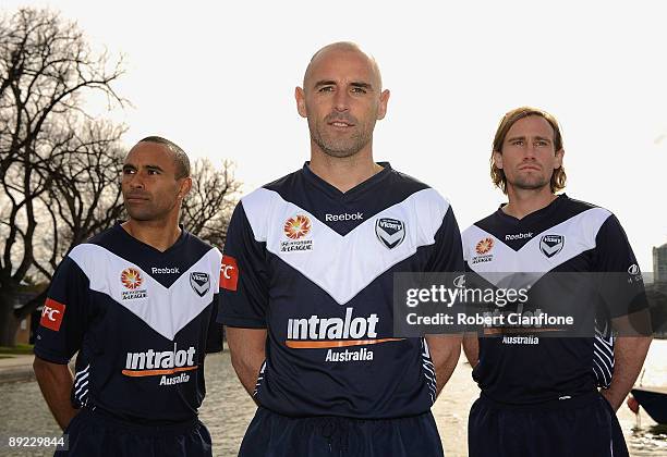 Archie Thompson, Kevin Muscat and Nick Ward of the Victory pose during the Melbourne Victory A-League television commercial shoot at Albert Park Lake...