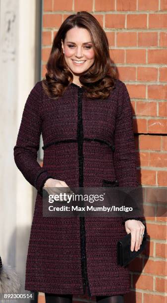 Catherine, Duchess of Cambridge attends the 'Magic Mums' community Christmas party held at Rugby Portobello Trust on December 12, 2017 in London,...