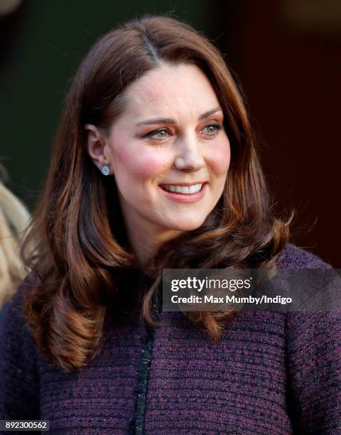 Catherine, Duchess of Cambridge attends the 'Magic Mums' community Christmas party held at Rugby Portobello Trust on December 12, 2017 in London,...