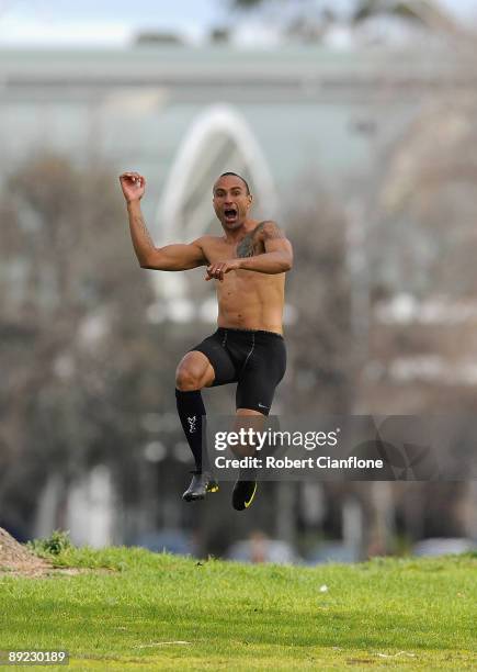 Archie Thompson of the Victory hams it up during the Melbourne Victory A-League television commercial shoot at Albert Park Lake on July 24, 2009 in...