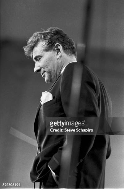 View of American composer, musician, and conductor Leonard Bernstein as he conducts at Carnegie Hall, New York, New York, 1959.