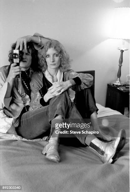 Portrait of couple, French photographer Michel Auder and actress Viva in their room at the Chelsea Hotel, New York, New York, 1969.