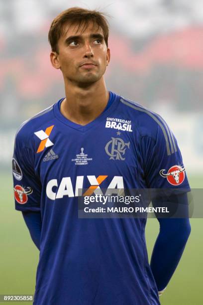 Brazil's Flamengo goalkeeper Cesar sings his national anthem, before the start of their Copa Sudamericana football final match against Argentina's...