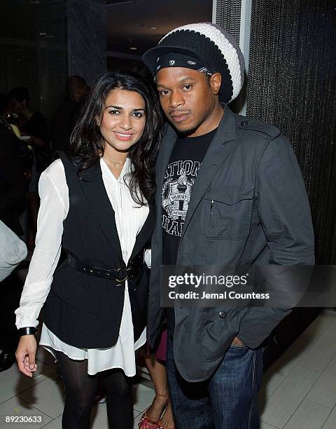 Actress Nadia Ali and media personality Sway attend the She-Blogs.com Launch Party at Saks Fifth Avenue on July 23, 2009 in New York City.