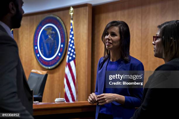 Jessica Rosenworcel, commissioner at the Federal Communications Commission , center, speaks to attendees before an open commission meeting in...