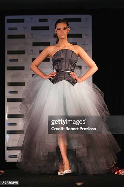 Model showcases a 'Cappellazzo Couture' outfit at the official unveiling of the Australian national costume and wardrobe for Miss Universe at Park...