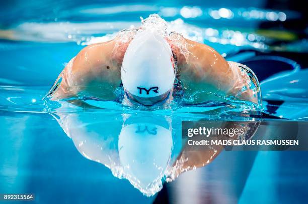 Emilie Beckmann from Denmark competes during the 50 meter butterfly semifinal at the LEN European Short Course Swimming Championships at the Royal...