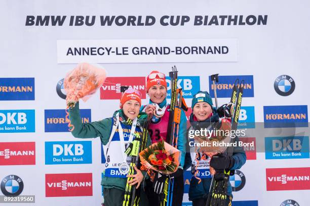 2nd place Laura Dahlmeier of Germany, 1st place Anastasiya Kuzmina of Slovakia and 3rd place Vita Semerenko of Ukraine pose on the podium during the...