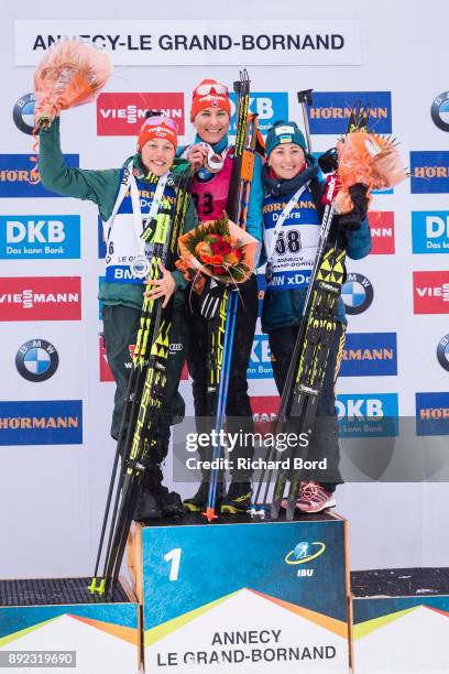2nd place Laura Dahlmeier of Germany, 1st place Anastasiya Kuzmina of Slovakia and 3rd place Vita Semerenko of Ukraine pose on the podium during the...