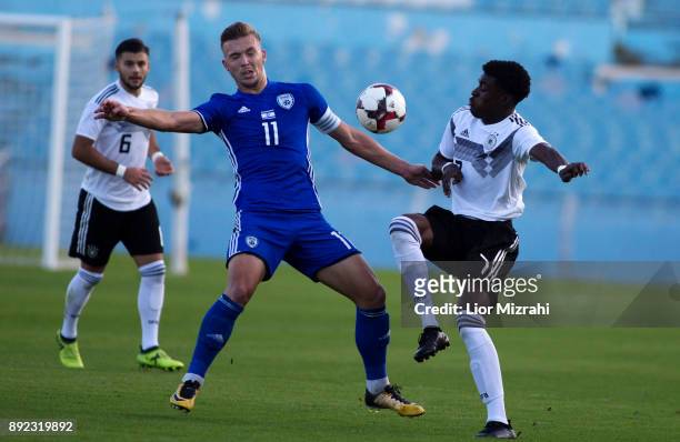 Charles-Jesaja Herrmann of Germany in action with Eden Karzev of Israel during the U18 final match at the Winter Tournament on December 14, 2017 in...