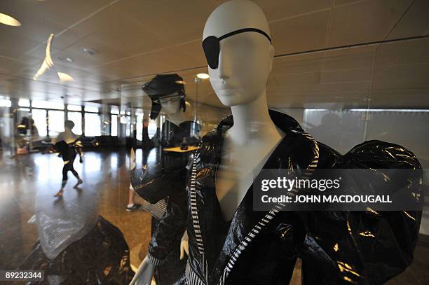 Ensembles made of plastic film by east German fashion designer Sabine von Oettingen are on display at the exhibition "In Grenzen Frei" in Berlin July...