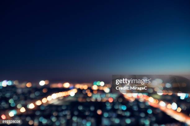 city night bokeh - citylight stockfoto's en -beelden