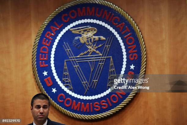 Federal Communications Commission Chairman Ajit Pai listens during a commission meeting December 14, 2017 in Washington, DC. The FCC is scheduled to...