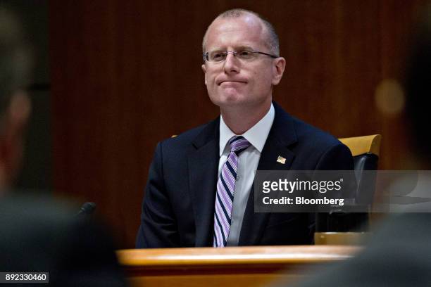 Brendan Carr, commissioner at the Federal Communications Commission , listens during an open commission meeting in Washington, D.C., U.S., on...