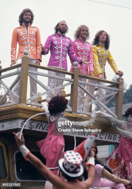 View of, top from left, musicians Barry and Maurice Gibb , Peter Frampton , and Robin Gibb in a scene from the film 'Sgt Pepper's Lonely Hearts Club...
