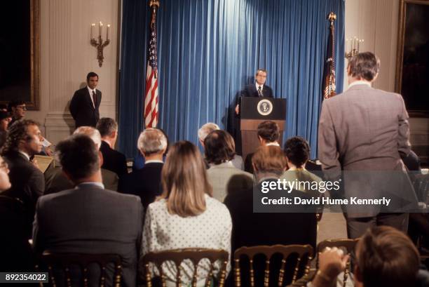 President Richard Nixon at a press conference with reporters, Washington DC, September 5, 1973. White House Press Secretary Ron Ziegler stands near...