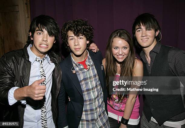 Joseph Jonas, Nick Jonas, Miley Cyrus and Kevin Jonas *EXCLUSIVE*