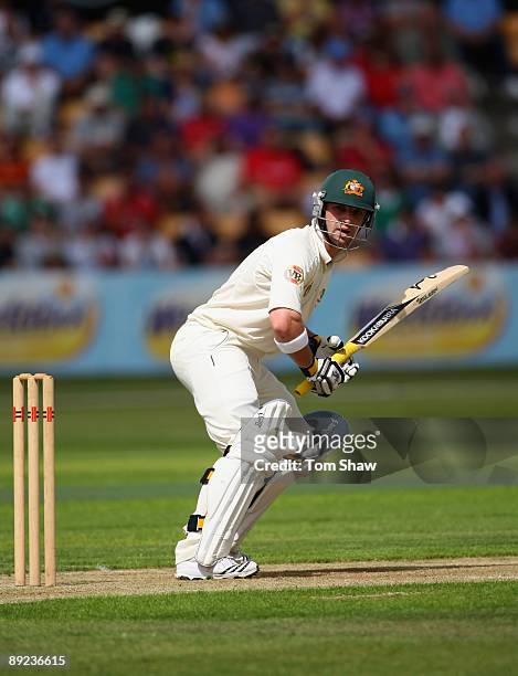 Phillip Hughes of Australia hits out during the tour match between Northamptonshire and Australia at the County Ground on July 24, 2009 in...
