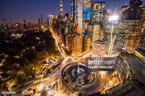 columbus square from above at night, new york - above central park stockfoto's en -beelden