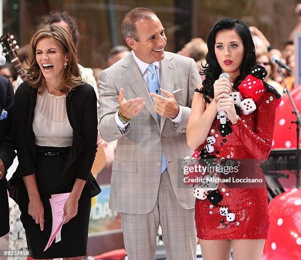 Anchors Natalie Morales and Matt Lauer talk with singer Katy Perry after Perry's performance on NBC's "Today" at Rockefeller Center on July 24, 2009...