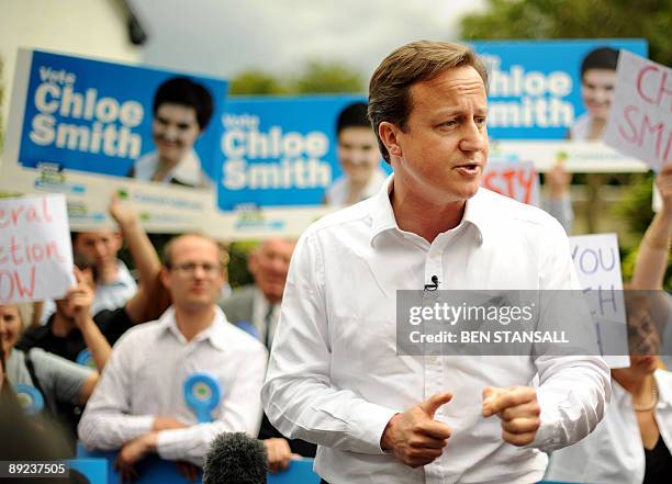 Leader of the British Conservative party David Cameron speaks to the media and supporters after Chloe Smith won the Norwich North by-election on July...