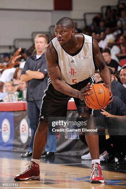 Jermaine Taylor of the Houston Rockets handles the ball against the Portland Trail Blazers during NBA Summer League presented by EA Sports on July...