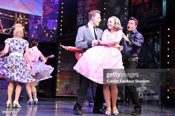 Scott Bruton, Daisy Wood-Davis and Ben Freeman perform during a photocall for Dreamboats and Petticoats as it transfers to the West End at The Savoy...