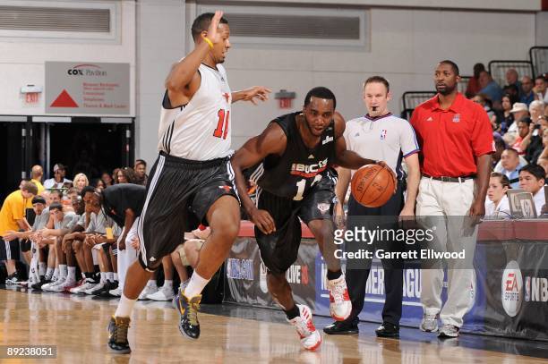 Luc Mbah a Moute of the Milwaukee Bucks drives against James Johnson of the Chicago Bulls during NBA Summer League presented by EA Sports on July 15,...