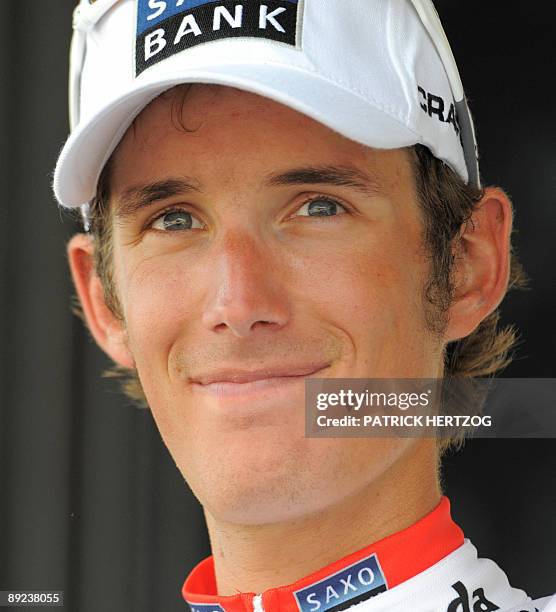 Danish cycling team Team Saxo Bank 's leader Andy Schleck of Luxemburg celebrates on the podium white jersey of best young on July 24, 2009 in the...