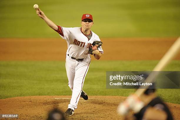 Logan Kensing of the Washington Nationals pitches during a baseball game against the New York Mets on July 20, 2009 at Nationals Park in Washington...