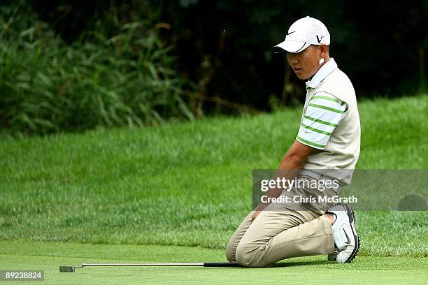 Anthony Kim reacts to missing a putt on the 16th green during round one of the RBC Canadian Open at Glen Abbey Golf Club on July 24, 2009 in...