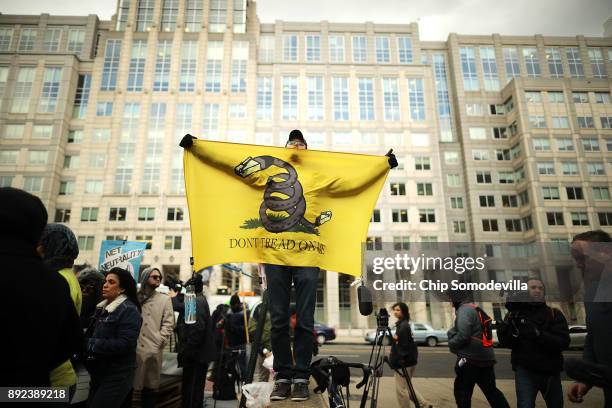 Demonstrators rally outside the Federal Communication Commission building to protest against the end of net neutralityrules December 14, 2017 in...