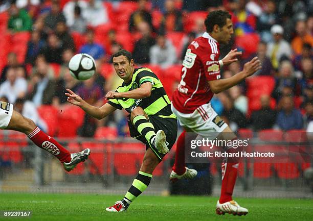 Scott McDonald of Celtic shoots to score Celtic's fourth goal during the Wembley Cup match between Celtic and Al Ahly at Wembley Stadium on July 24,...